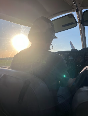 Adam Mages Flying a plane